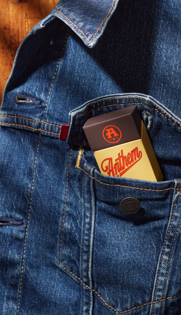 Pack of Anthem hanging out of jeans pocket